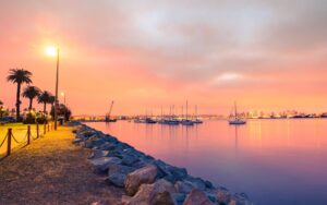 Warm sunset over a calm San Diego waterfront during fall