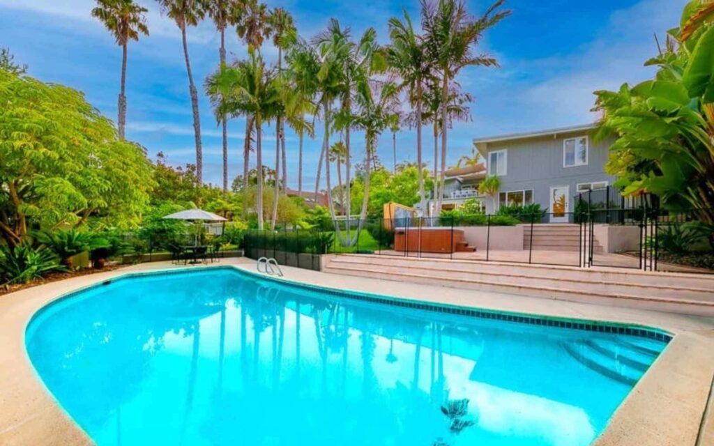 san diego vacation rental pool property management Pool and landscaped backyard at a San Diego vacation rental property